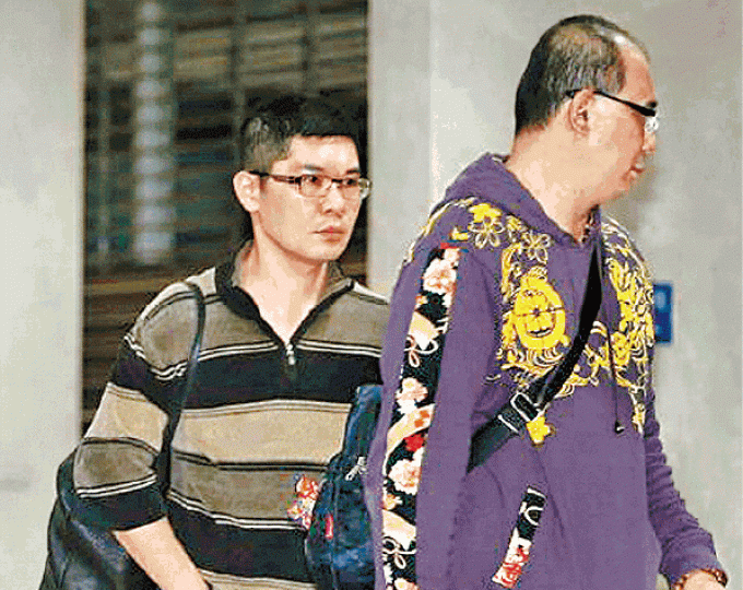 ■台灣整容名醫張耀元(左)被移送北檢。台灣《蘋果日報》 ■台灣整容名醫張耀元(左)被移送北檢。台灣《蘋果日報》