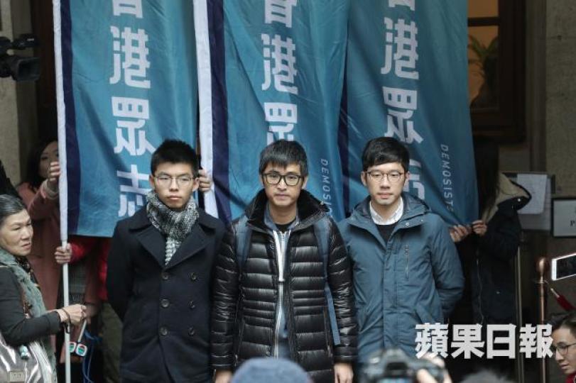 ■左起:黃之鋒、周永康、羅冠聰
■左起:黃之鋒、周永康、羅冠聰