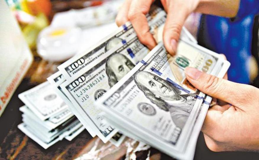 ■美元匯價昨最多升0.3%,創一周新高。資料圖片 ■美元匯價昨最多升0.3%,創一周新高。資料圖片