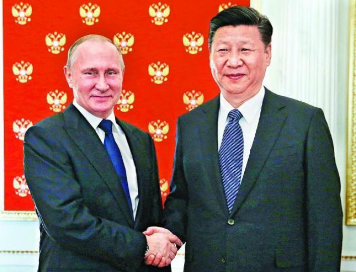 ■一直盛傳習近平想學俄羅斯總統普京當「永遠主席」。 ■一直盛傳習近平想學俄羅斯總統普京當「永遠主席」。