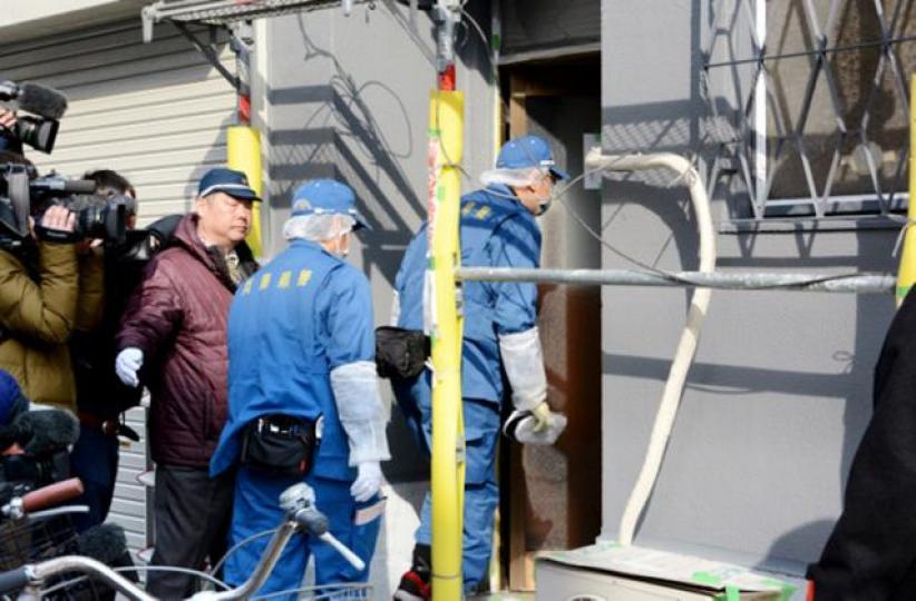 ■警方在發現人頭單位調查。 ■警方在發現人頭單位調查。
