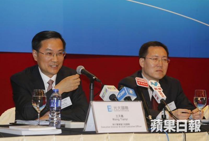 ■光大國際行政總裁王天義（左）表示，未來會增加科研發展。譚德潤攝