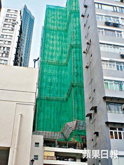 ■跑馬地山光苑大廈外牆正在搭棚翻新。