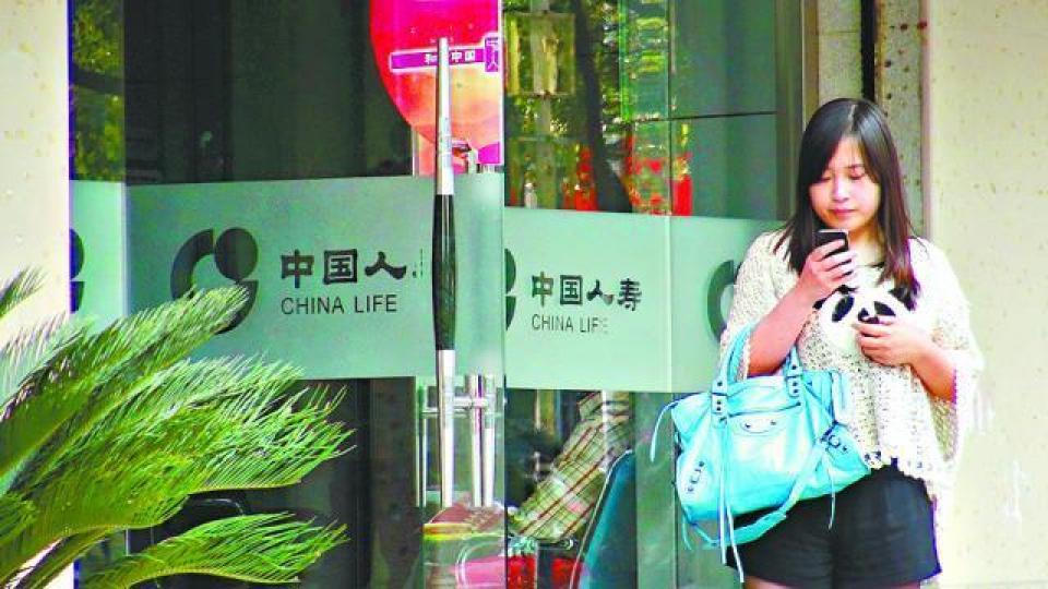 ■中國人壽去年純利升近七成。資料圖片
■中國人壽去年純利升近七成。資料圖片