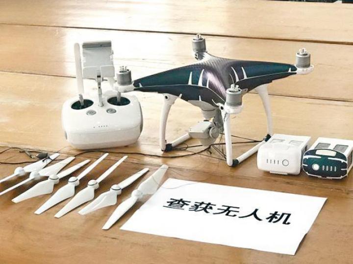■無人機牽線頭由深圳到達港境,接應者將線頭固定樹上。■跨境飛索設置好後,走私分子以絞線走私貨物。 ■無人機牽線頭由深圳到達港境,接應者將線頭固定樹上。■跨境飛索設置好後,走私分子以絞線走私貨物。
