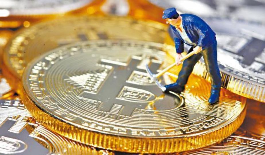 ■比特幣昨重越七千關,惟累計全季仍跌50.3%。資料圖片 ■比特幣昨重越七千關,惟累計全季仍跌50.3%。資料圖片