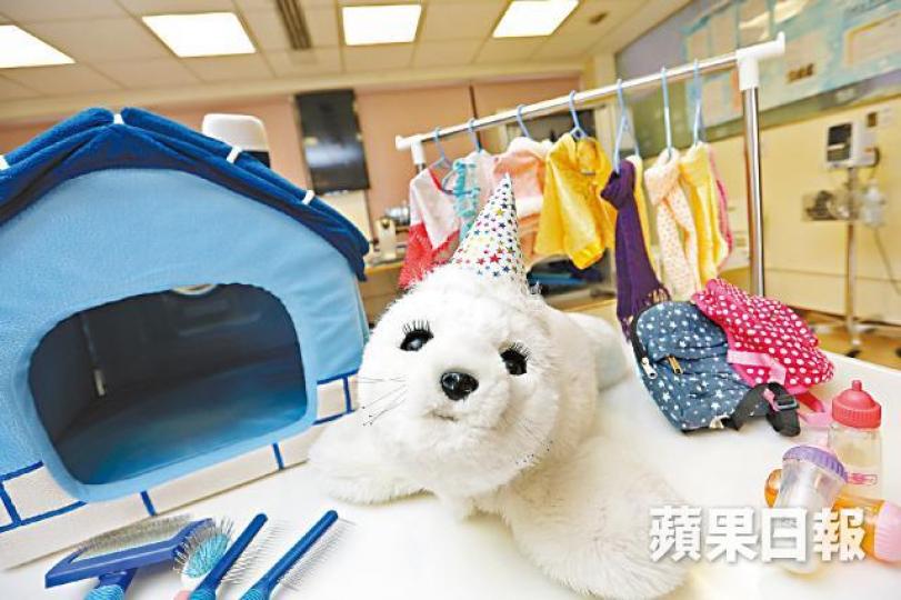■「小白」鼻子內藏兩個感應器,可辨認人像容貌。王心義攝 ■「小白」鼻子內藏兩個感應器,可辨認人像容貌。王心義攝