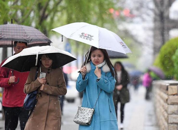 ■北京昨日氣溫急降,迎來雨夾雪天氣。 ■北京昨日氣溫急降,迎來雨夾雪天氣。