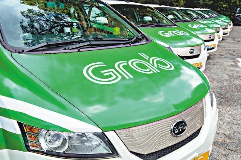■電召車公司Grab總部位於新加坡。互聯網 ■電召車公司Grab總部位於新加坡。互聯網