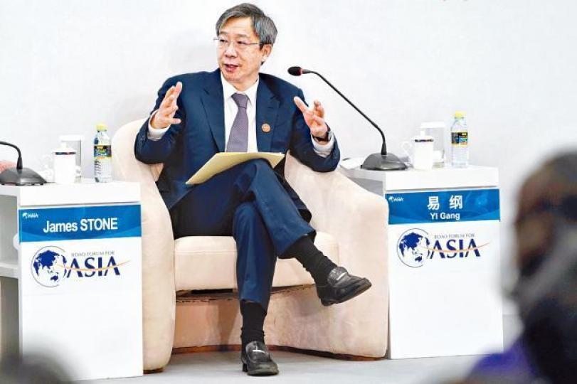 ■人行行長易綱昨宣佈5月1日起內地和香港互聯互通額度擴大四倍。路透社 ■人行行長易綱昨宣佈5月1日起內地和香港互聯互通額度擴大四倍。路透社
