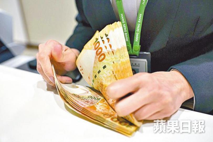 ■陳茂波指,當港元利率上升,資金流出就會減慢。資料圖片 ■陳茂波指,當港元利率上升,資金流出就會減慢。資料圖片