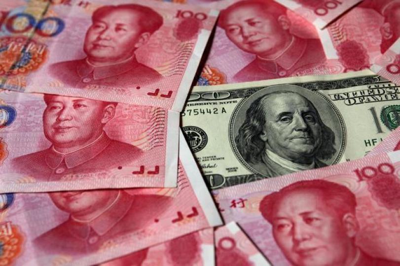 ■法國外貿銀行預測,美元年底兌6.25人民幣。資料圖片 ■法國外貿銀行預測,美元年底兌6.25人民幣。資料圖片