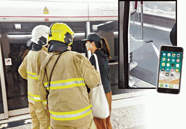 ■消防員向女機主了解事件(左圖),冒煙的iPhone7 Plus手機被遺在車廂內(上圖)。 ■消防員向女機主了解事件(左圖),冒煙的iPhone7 Plus手機被遺在車廂內(上圖)。