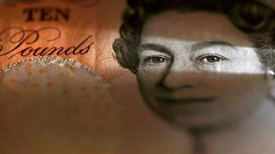 ■市場對英倫銀行5月加息預期降溫,拖累英鎊滙價捱沽。資料圖片 ■市場對英倫銀行5月加息預期降溫,拖累英鎊滙價捱沽。資料圖片