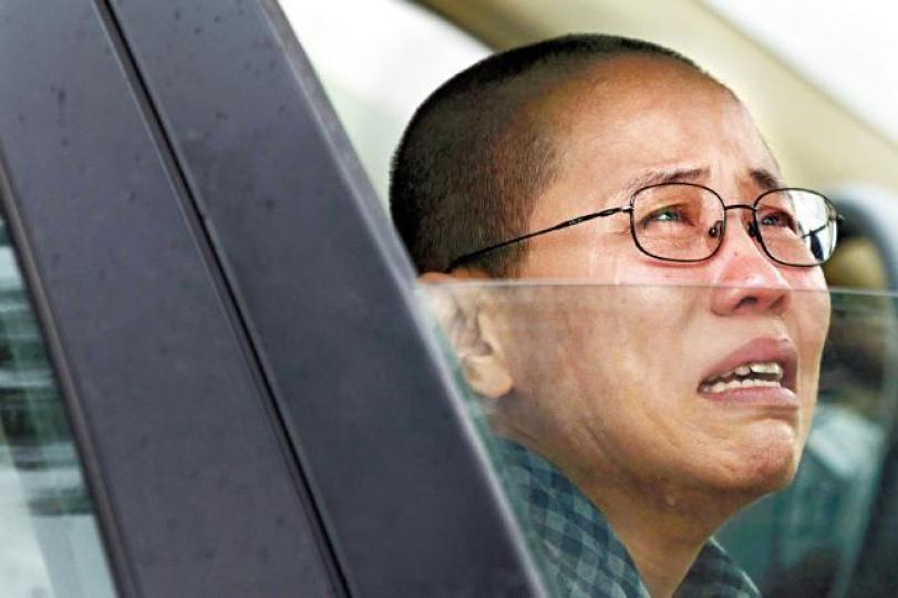 ■劉霞已被北京軟禁超過7年,日前向好友哭訴出國無望。資料圖片 ■劉霞已被北京軟禁超過7年,日前向好友哭訴出國無望。資料圖片