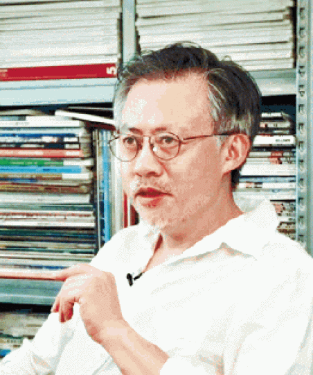 ■《GQ》台灣版總編輯杜祖業因掛「反攻大陸」彩帶而惹禍。 ■《GQ》台灣版總編輯杜祖業因掛「反攻大陸」彩帶而惹禍。