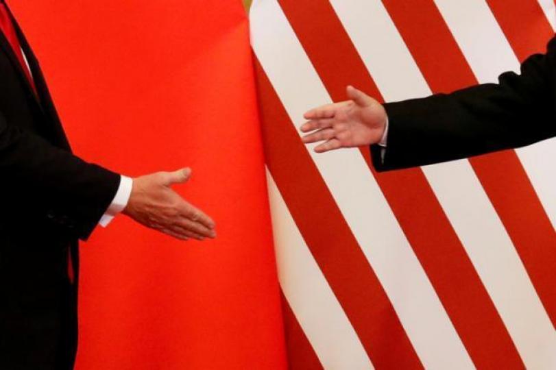 ■美中貿易戰對潛在的經濟影響龐大,相信兩國均有強烈誘因透過磋商達成協議。資料圖片 ■美中貿易戰對潛在的經濟影響龐大,相信兩國均有強烈誘因透過磋商達成協議。資料圖片