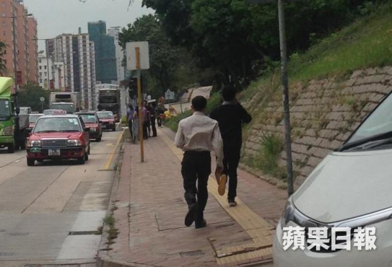 ■被告盧成禮(左)及羅冠麟(右)。 ■被告盧成禮(左)及羅冠麟(右)。