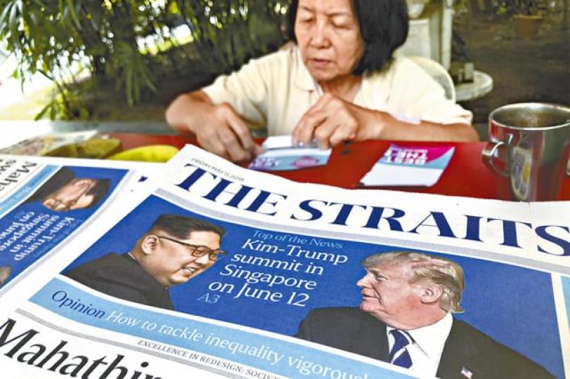 ■美朝峰會在新加坡舉行,是當地大新聞。美聯社■新加坡人希望特朗普和金正恩品嚐當地馳名雞飯。 ■美朝峰會在新加坡舉行,是當地大新聞。美聯社■新加坡人希望特朗普和金正恩品嚐當地馳名雞飯。