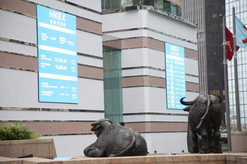 ■港股短期動力未夠,相信恒指要到第三季才會再挑戰歷史新高。資料圖片 ■港股短期動力未夠,相信恒指要到第三季才會再挑戰歷史新高。資料圖片