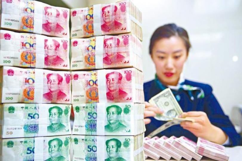 ■人行批准清算行將存款準備金率由16%降至零厘,即釋放更多可用資金。資料圖片 ■人行批准清算行將存款準備金率由16%降至零厘,即釋放更多可用資金。資料圖片