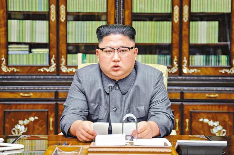 ■金正恩髮型獨特。資料圖片 ■金正恩髮型獨特。資料圖片