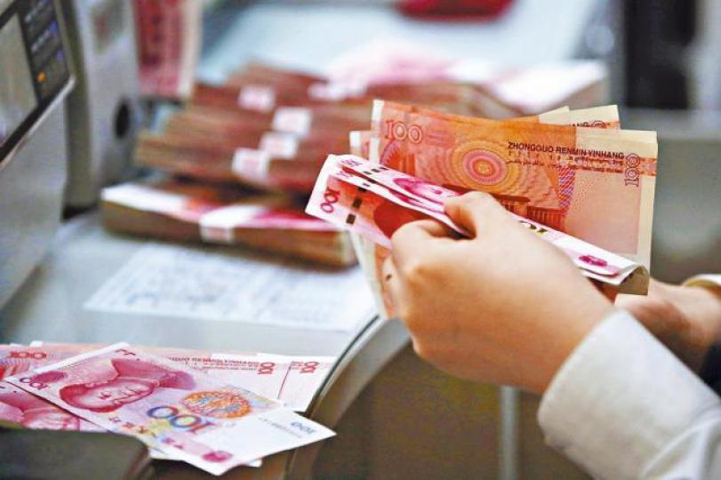 ■人民幣國際化繼續保持向好的勢頭。資料圖片 ■人民幣國際化繼續保持向好的勢頭。資料圖片