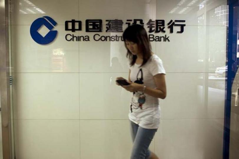 ■近期資金傾向部署內銀股好倉追落後,當中流入建行認購證的資金較多。 資料圖片 ■近期資金傾向部署內銀股好倉追落後,當中流入建行認購證的資金較多。 資料圖片