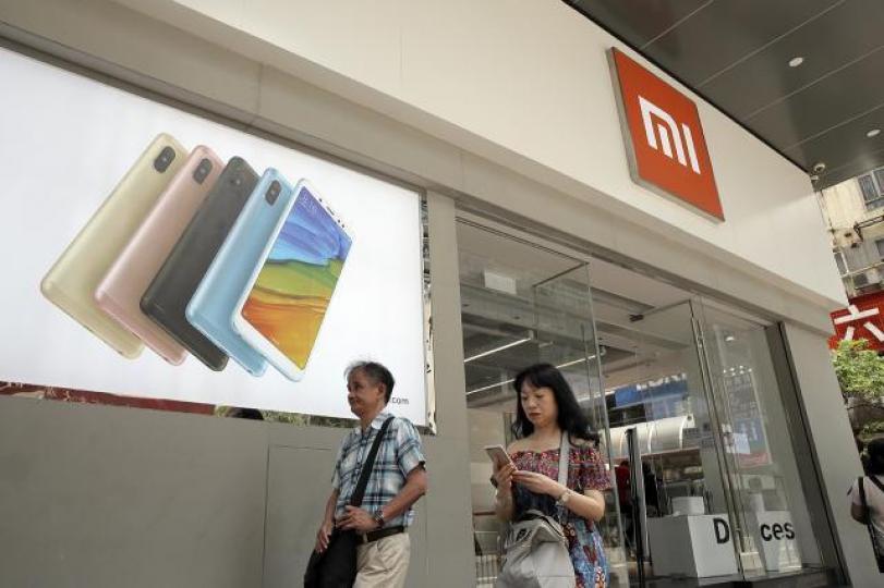 ■小米上市若能做靚個勢,至少上市初期托得住,可以為下隻同股不同權鋪路。資料圖片 ■小米上市若能做靚個勢,至少上市初期托得住,可以為下隻同股不同權鋪路。資料圖片