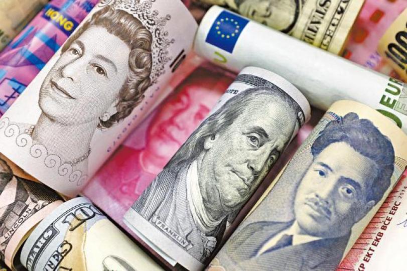 ■內地明日起推出以境外外幣債為抵押品的外幣拆借業務。資料圖片 ■內地明日起推出以境外外幣債為抵押品的外幣拆借業務。資料圖片