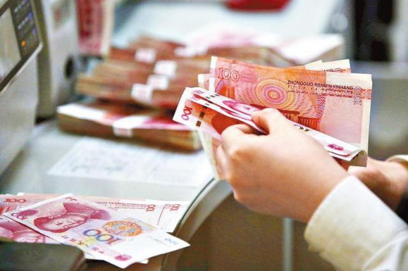 ■匯商認為人幣走勢仍取決於美元變化及貿易戰實質措施。資料圖片 ■匯商認為人幣走勢仍取決於美元變化及貿易戰實質措施。資料圖片