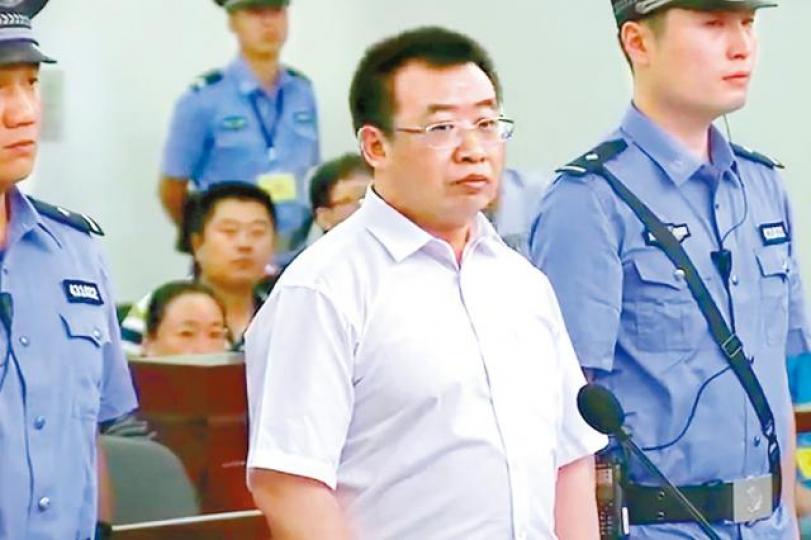 ■江天勇受審時出庭照。■江天勇妻子金變玲。 ■江天勇受審時出庭照。■江天勇妻子金變玲。