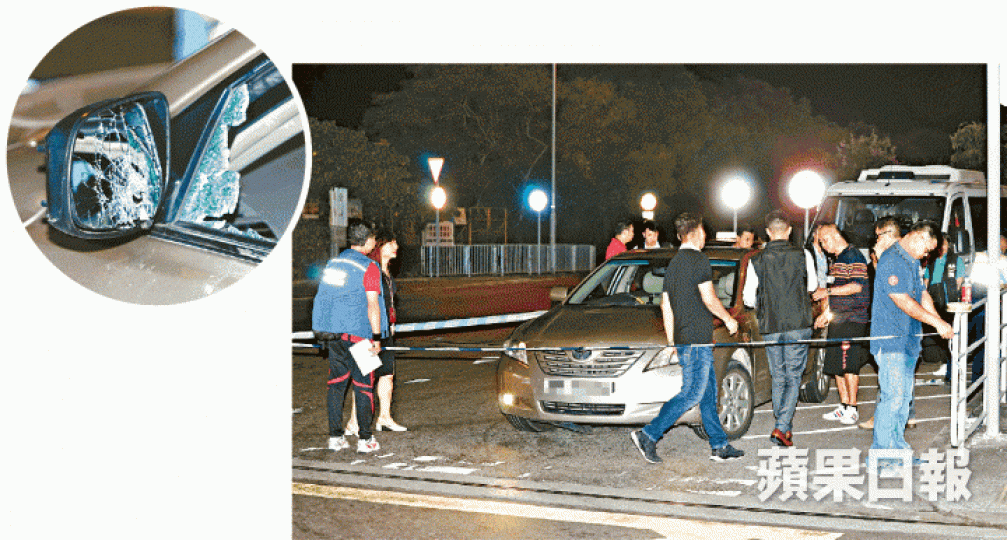 ■涉案私家車事後被警方發現,左邊倒後鏡留下彈孔(圓圖)。張家豪攝 ■涉案私家車事後被警方發現,左邊倒後鏡留下彈孔(圓圖)。張家豪攝