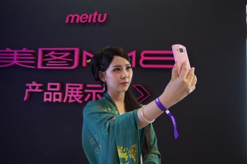 美圖上半年虧損1.3億人民幣。資料圖片 美圖上半年虧損1.3億人民幣。資料圖片