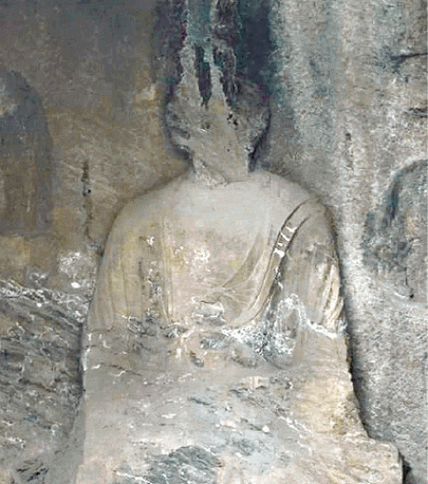 佛首所在的龍門奉先寺以南1720號石窟現狀。流失海外的唐代灰石雕佛首像。 佛首所在的龍門奉先寺以南1720號石窟現狀。流失海外的唐代灰石雕佛首像。