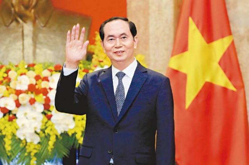 61歲的越南國家主席陳大光病逝,令外界意外。路透社陳大光逝世前兩日,仍有露面接見周強(右)。互聯網 61歲的越南國家主席陳大光病逝,令外界意外。路透社陳大光逝世前兩日,仍有露面接見周強(右)。互聯網