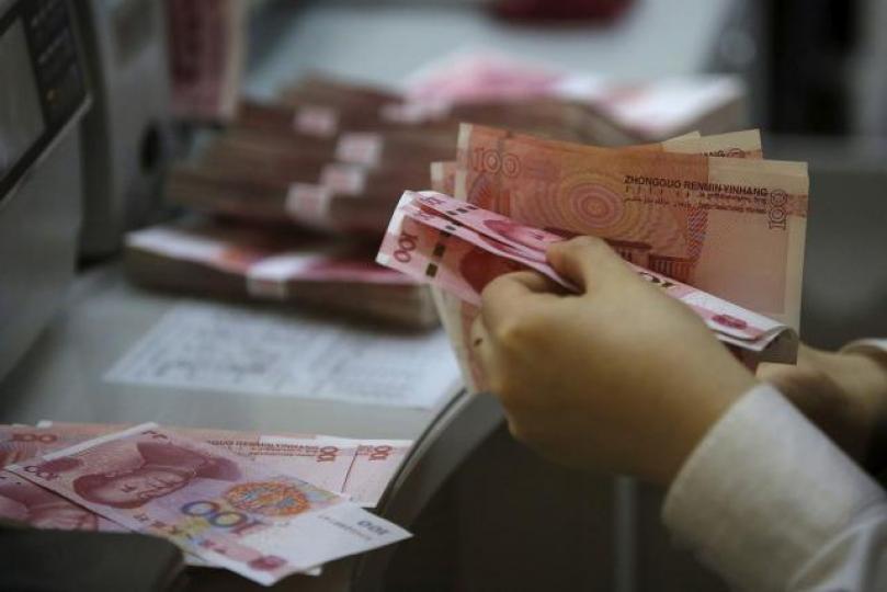 不少投資者預期人民幣將會跌穿7算。資料圖片 不少投資者預期人民幣將會跌穿7算。資料圖片