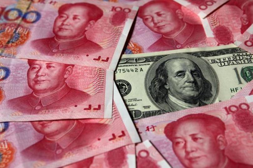 市場已經有超過300億資金賭人仔兌美金會穿7算,如果阿爺唔出手,7算好快就穿。資料圖片 市場已經有超過300億資金賭人仔兌美金會穿7算,如果阿爺唔出手,7算好快就穿。資料圖片