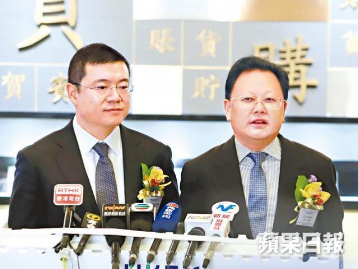 贛鋒鋰業副董事長王曉申(左)及董事長李良彬昨出席上市儀式。譚德潤攝 贛鋒鋰業副董事長王曉申(左)及董事長李良彬昨出席上市儀式。譚德潤攝