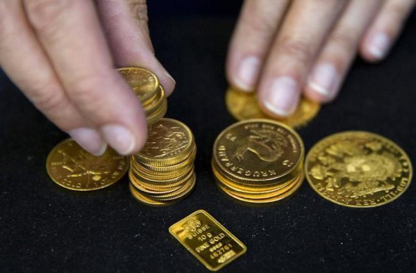 聰明錢似在進駐黃金,令金價無視美元仍在相對高位而向上。 資料圖片 聰明錢似在進駐黃金,令金價無視美元仍在相對高位而向上。 資料圖片