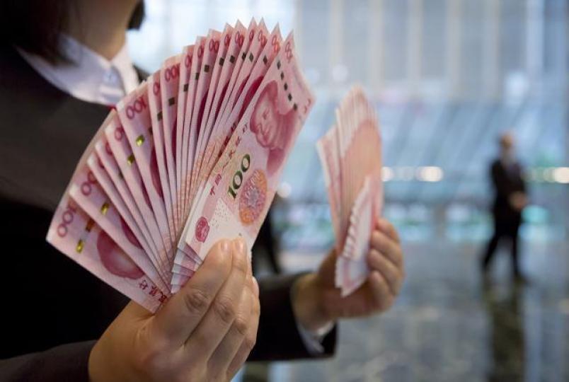 專家預料,人民幣短期滙價未必跌穿7算。資料圖片 專家預料,人民幣短期滙價未必跌穿7算。資料圖片