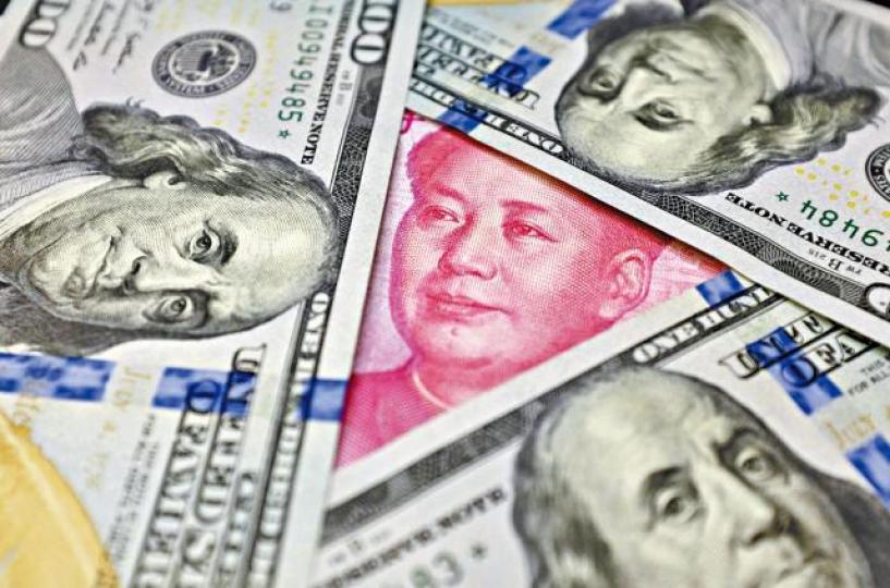 美滙指數走強下,離岸人民幣曾創近兩年低位。資料圖片 美滙指數走強下,離岸人民幣曾創近兩年低位。資料圖片