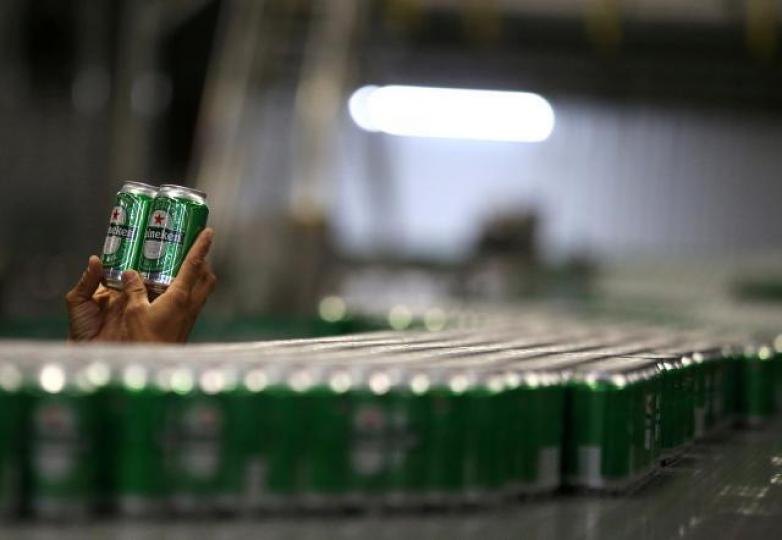華潤啤酒旗下雪花啤酒收購喜力於中國6家公司的全部股權。資料圖片 華潤啤酒旗下雪花啤酒收購喜力於中國6家公司的全部股權。資料圖片