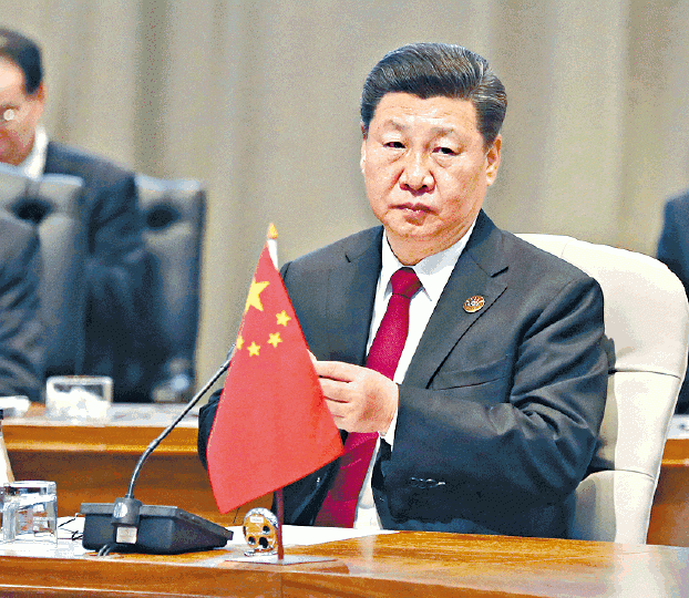 中美爆貿易戰,加上中國經濟增長放緩,令習近平大傷腦筋。資料圖片 中美爆貿易戰,加上中國經濟增長放緩,令習近平大傷腦筋。資料圖片