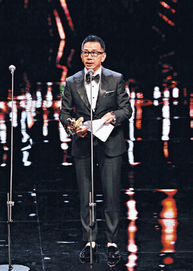 香港演員袁富華憑《翠絲》贏得最佳男配角。 香港演員袁富華憑《翠絲》贏得最佳男配角。