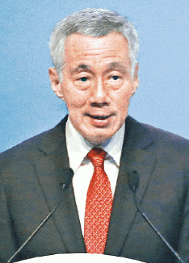 李顯龍表明下屆大選將退下來。被視為已內定接任總理的財長王瑞杰。 李顯龍表明下屆大選將退下來。被視為已內定接任總理的財長王瑞杰。