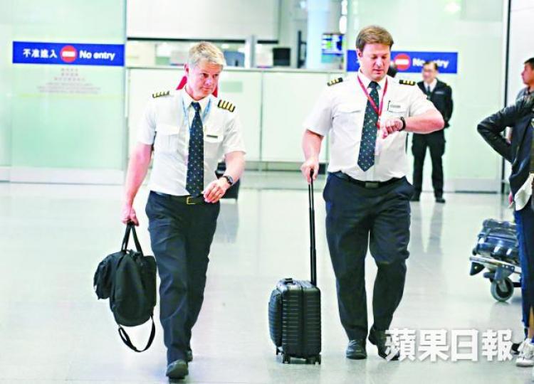 國泰機師與資方談判四年,雙方或有望達成協議。資料圖片 國泰機師與資方談判四年,雙方或有望達成協議。資料圖片
