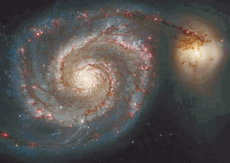 科學家認為圖中所示渦狀星系和M51B星系相撞,銀河系亦會發生。 科學家認為圖中所示渦狀星系和M51B星系相撞,銀河系亦會發生。