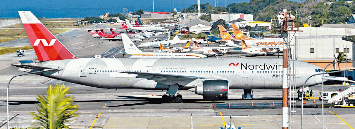 一架俄羅斯北風客機前日停在委內瑞拉首都機場,疑為執政黨偷運黃金出境。瓜伊多前日與人民上街對抗馬杜羅。路透社 一架俄羅斯北風客機前日停在委內瑞拉首都機場,疑為執政黨偷運黃金出境。瓜伊多前日與人民上街對抗馬杜羅。路透社