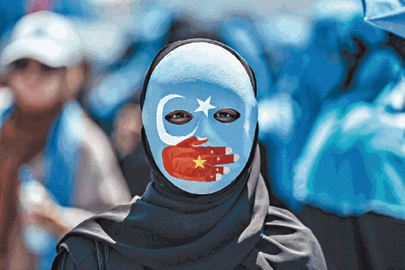 土國示威者戴上東突面具,反對中共極權。 土國示威者戴上東突面具,反對中共極權。